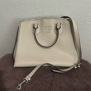 DKNY cream medium leather handbag with top handle and crossbody handle satchel